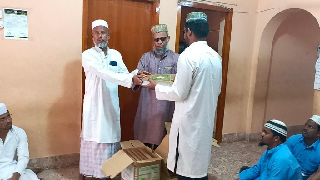 Sadaqah20 Group presented the Madrasa with braille Qurans as gifts to their top students